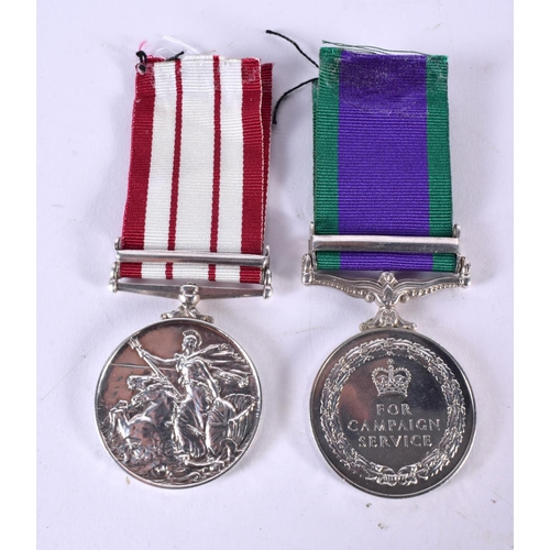 450 - A PAIR OF ER II ROYAL MARINE MEDALS RM 17932 S Howard Mne R M. 82 grams. 5 cm x 3.5 cm.