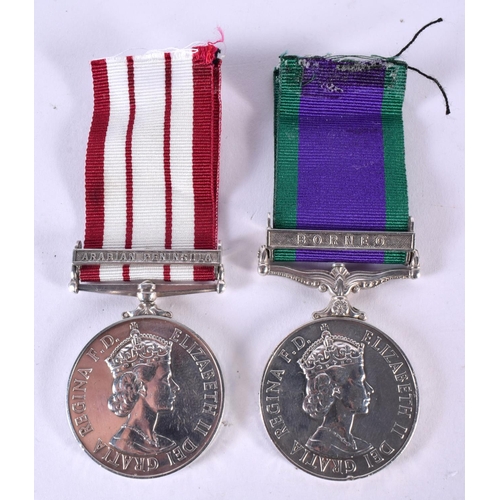 450 - A PAIR OF ER II ROYAL MARINE MEDALS RM 17932 S Howard Mne R M. 82 grams. 5 cm x 3.5 cm.