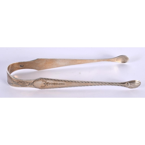 53 - A PAIR OF GEORGE III SILVER SUGAR NIPS Maker GB. 31.3 grams. 13.75 cm x 4.75 cm.