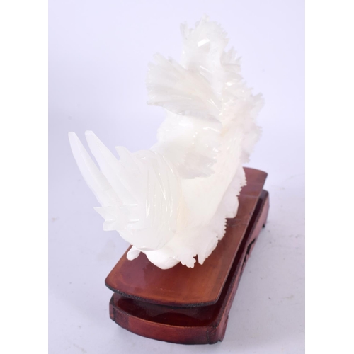 579 - A LARGE BOXED CHINESE REPUBLICAN PERIOD WHITE JADE SEA SLUG of naturalistic form. 27 cm x 15 cm.