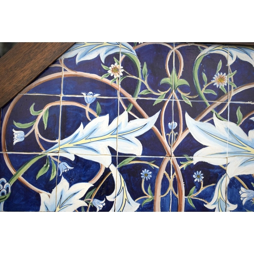 586 - A LARGE CONTEMPORARY TROMPE L'OIL POTTERY PANEL painted with stylised flowers and vines. 98 cm x 68 ... 