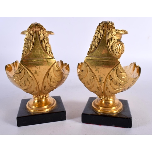 8 - A PAIR OF EARLY 19TH CENTURY ENGLISH REGENCY ORMOLU OIL LAMPS modelled in the classical Romanesque m... 