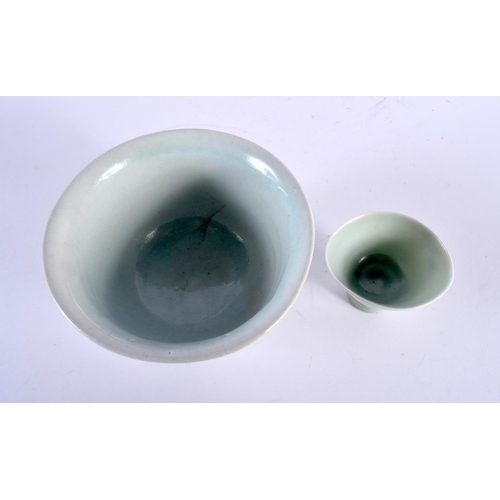 10 - A ST IVES CELADON GLAZED PORCELAIN BOWL together with a similar teabowl. Largest 12.5 cm wide. (2)