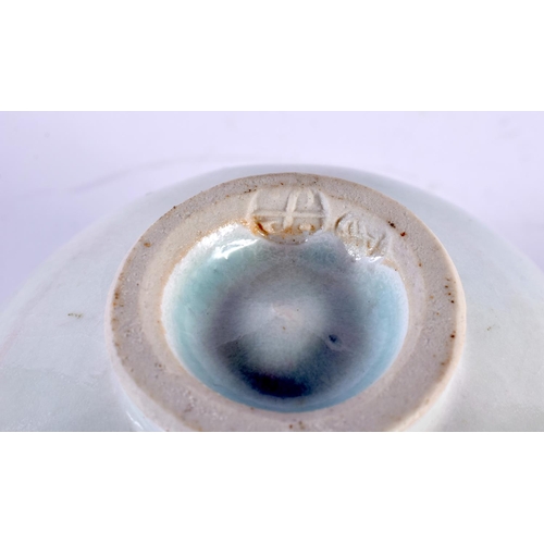 10 - A ST IVES CELADON GLAZED PORCELAIN BOWL together with a similar teabowl. Largest 12.5 cm wide. (2)