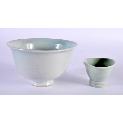 10 - A ST IVES CELADON GLAZED PORCELAIN BOWL together with a similar teabowl. Largest 12.5 cm wide. (2)