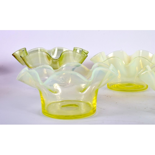 11 - SEVEN ART DECO VASELINE GLASS CRIMPED BOWLS. 13 cm wide. (7)