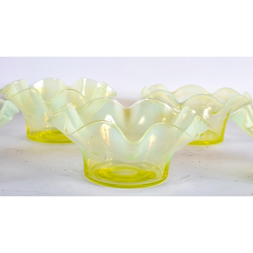 11 - SEVEN ART DECO VASELINE GLASS CRIMPED BOWLS. 13 cm wide. (7)