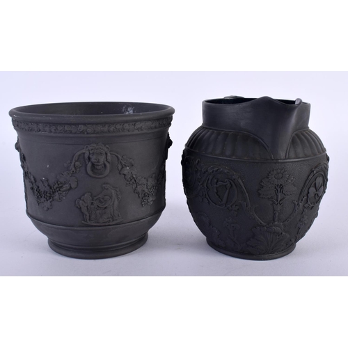 114 - TWO 19TH CENTURY WEDGWOOD BLACK BASALT WARES decorated with classical scenes. Largest 12 cm wide. (2... 