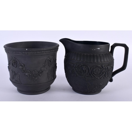 114 - TWO 19TH CENTURY WEDGWOOD BLACK BASALT WARES decorated with classical scenes. Largest 12 cm wide. (2... 