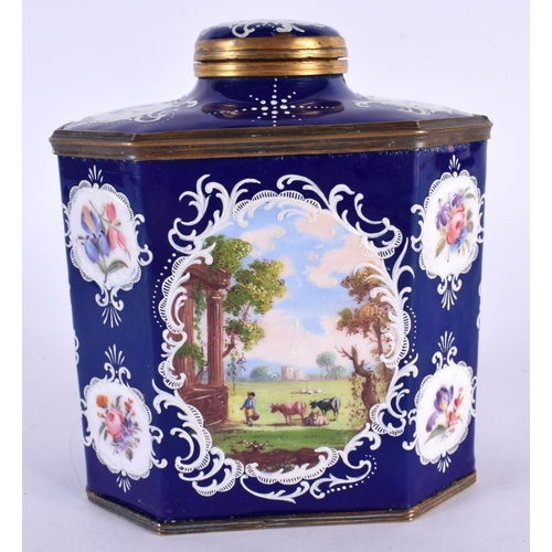 120 - A FINE 18TH CENTURY ENGLISH BATTERSEA ENAMEL TEA CADDY AND COVER painted with landscapes. 13 cm x 9 ... 