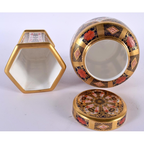 123 - A ROYAL CROWN DERBY IMARI 1128 TEA CADDY AND COVER together with a similar vase. 11cm high. (2)