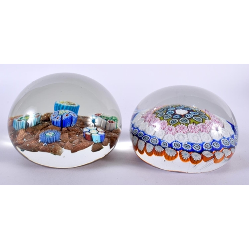 124 - TWO LARGE GLASS PAPERWEIGHTS. 8.5 cm diameter. (2)