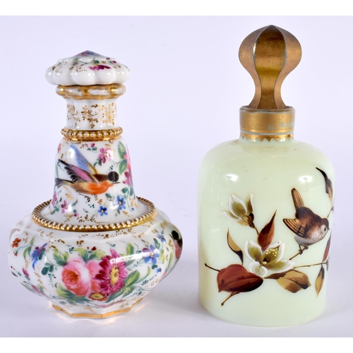 139 - A 19TH CENTURY ENGLISH PORCELAIN SCENT BOTTLE AND STOPPER together with an opaline glass bottle. Lar... 