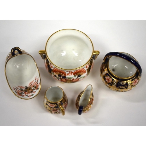 152 - 20th century Royal Crown Derby miniature wares consisting of a mug, sauceboat, spoon warmer, cauldro... 