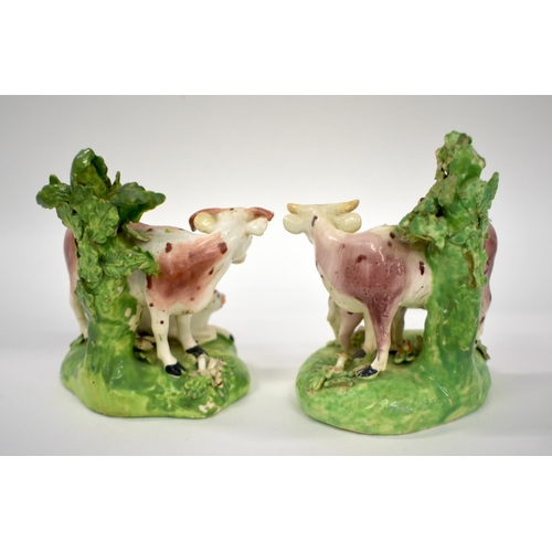 155 - 18th century Derby pair of figures of cow and calf groups, c.1780.  12cm high