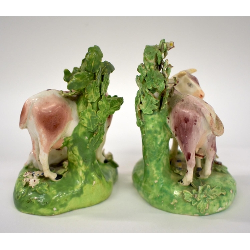 155 - 18th century Derby pair of figures of cow and calf groups, c.1780.  12cm high