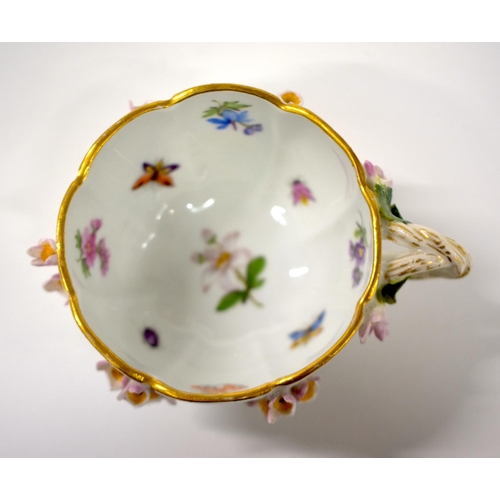 160 - Late 19th century Meissen floral encrusted cup and saucer painted with flowers and insects, crossed ... 