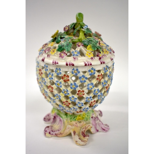 169 - 18th century Bow rare pierced vase and cover with rococo scroll foot and floral encrusted cover the ... 