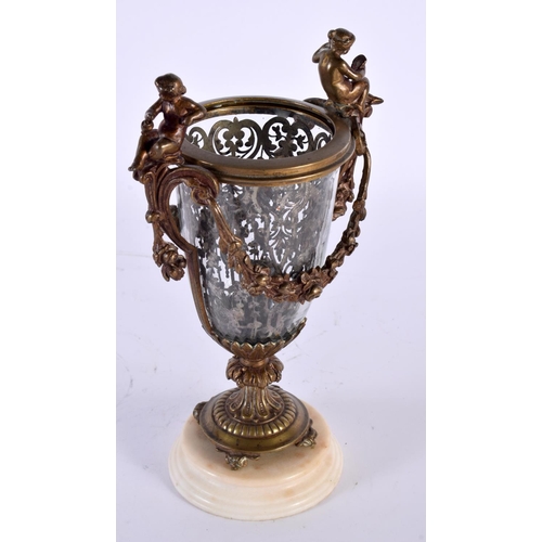 17 - A MID 19TH CENTURY FRENCH BRONZE AND GLASS VASE with unusual silver work interior. 23 cm high.