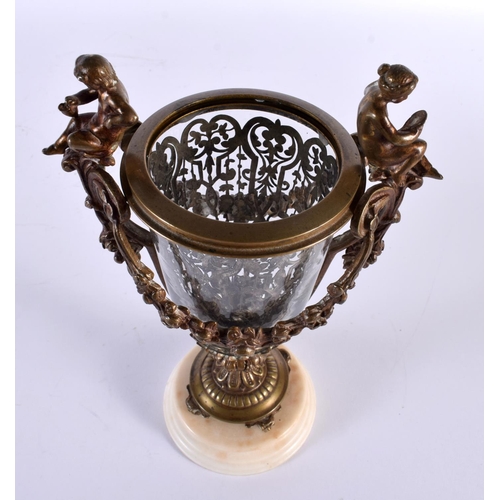 17 - A MID 19TH CENTURY FRENCH BRONZE AND GLASS VASE with unusual silver work interior. 23 cm high.