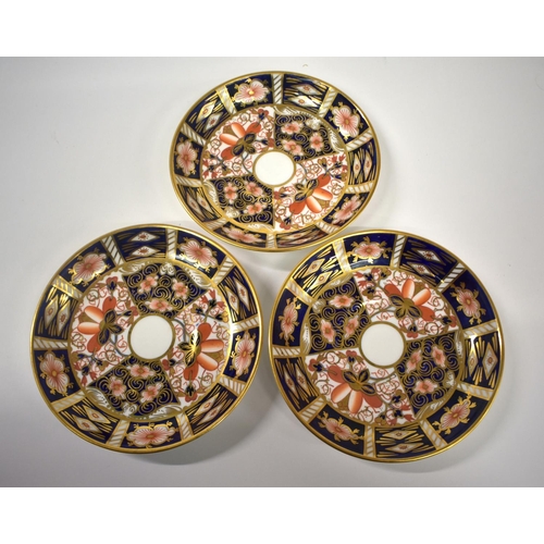 216 - Royal Crown Derby set of six coffee cans and saucers, painted with imari pattern 2451, having ornate... 