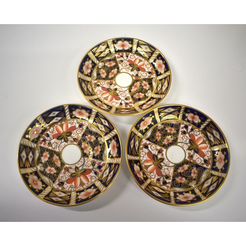 216 - Royal Crown Derby set of six coffee cans and saucers, painted with imari pattern 2451, having ornate... 