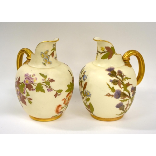 219 - Royal Worcester pair of jugs painted with flowers on an ivory ground date mark Z for 1888.  18cm h... 