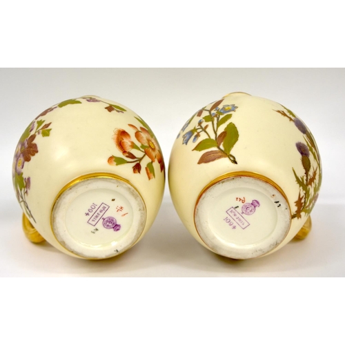 219 - Royal Worcester pair of jugs painted with flowers on an ivory ground date mark Z for 1888.  18cm h... 