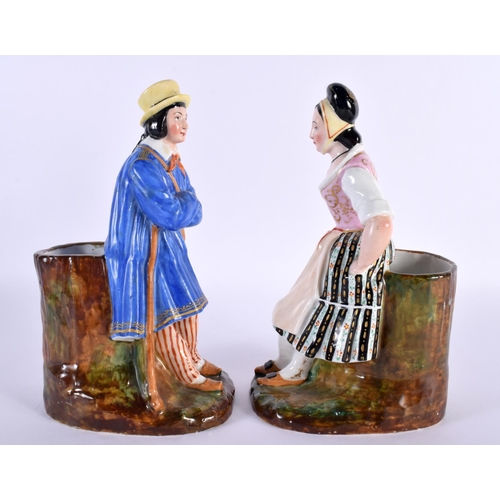 22 - A PAIR OF 19TH CENTURY RUSSIAN FRENCH PORCELAIN FIGURAL GROUPS depicting a male and female upon a na... 