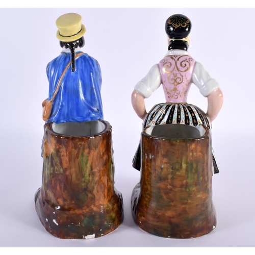 22 - A PAIR OF 19TH CENTURY RUSSIAN FRENCH PORCELAIN FIGURAL GROUPS depicting a male and female upon a na... 