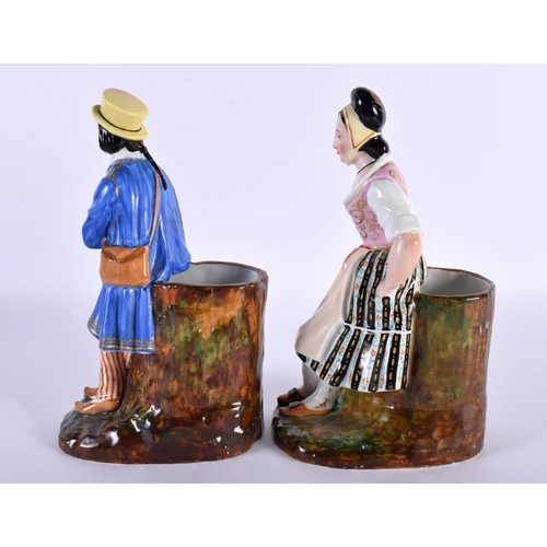 22 - A PAIR OF 19TH CENTURY RUSSIAN FRENCH PORCELAIN FIGURAL GROUPS depicting a male and female upon a na... 