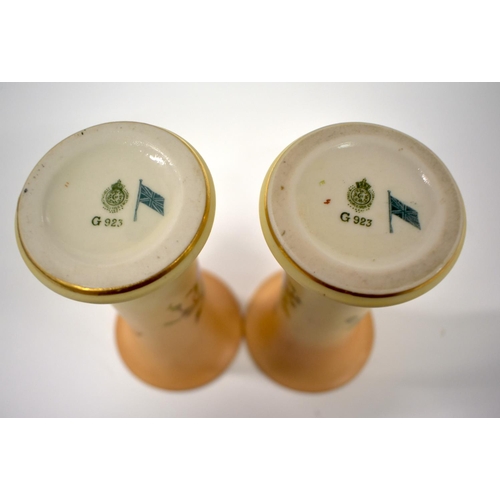 220 - Royal Worcester pair of vases painted in raised enamels with flowers on an blush ivory ground, shape... 