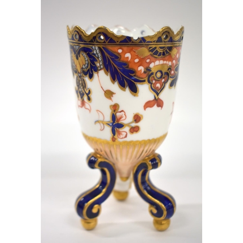 222 - 19th century Crown Derby or Davenport three footed vase painted in the imari Kings pattern.  13cm h... 