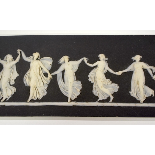 235 - Early 19th c. Wedgwood plaque with black basalt layer and seven well-modelled female figures in diap... 