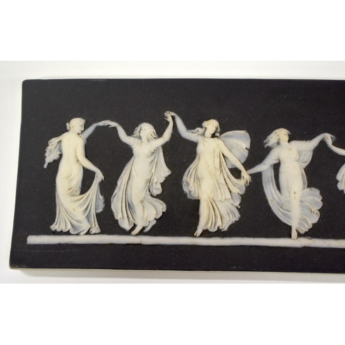 235 - Early 19th c. Wedgwood plaque with black basalt layer and seven well-modelled female figures in diap... 