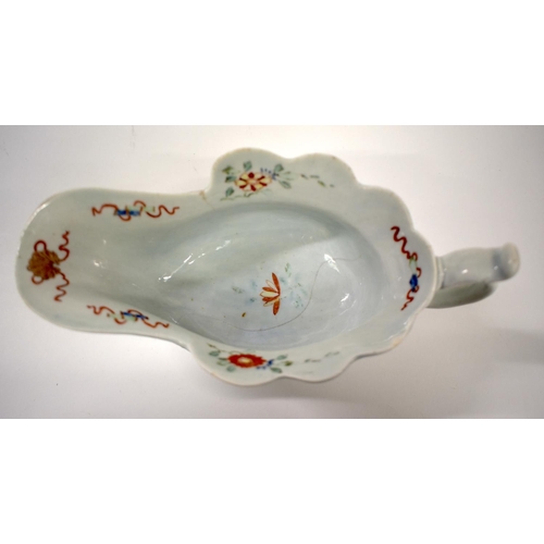 241 - 18th century Worcester early sauceboat of moulded high footed form painted with oriental figures on ... 