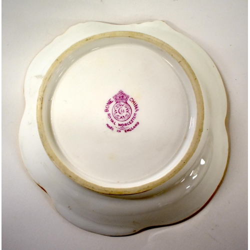 247 - Royal Worcester shaped dish painted with fruit by J. Freeman, signed, date mark 1939.  11.5cm wide