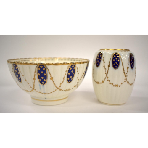 251 - 18th century Caughley part tea set decorated with blue and gilt oval panels with gilt chains beneath... 