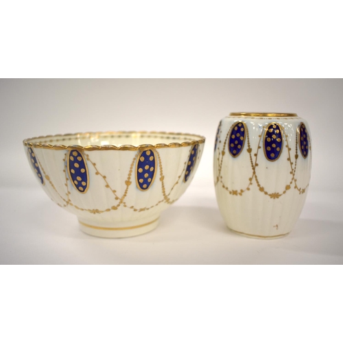 251 - 18th century Caughley part tea set decorated with blue and gilt oval panels with gilt chains beneath... 