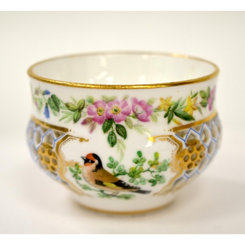 256 - 19th century Royal Worcester reticulated cup and saucer painted with flowers, a bird and an insect, ... 