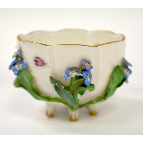 259 - 19th century Meissen floral encrusted cup and saucer painted with flowers and insects, crossed sword... 