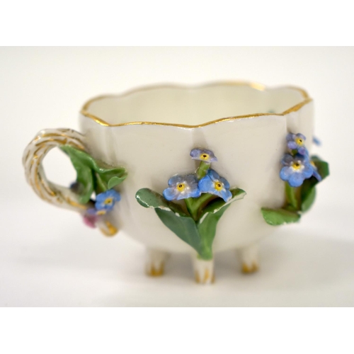 259 - 19th century Meissen floral encrusted cup and saucer painted with flowers and insects, crossed sword... 