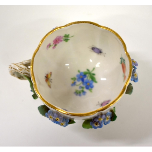 259 - 19th century Meissen floral encrusted cup and saucer painted with flowers and insects, crossed sword... 