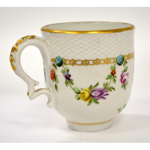 264 - 18th century Bristol coffee cup and saucer with moulded basket weave border painted with floral swag... 