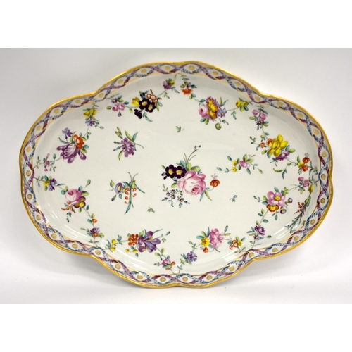 266 - Bristol large and impressive lobed oval dish  painted with suspended chains of flowers, surrounding ... 