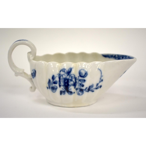 269 - 18th century Bristol rare creamboat painted with blue flowers on a flute moulded body Xmark, Burrows... 