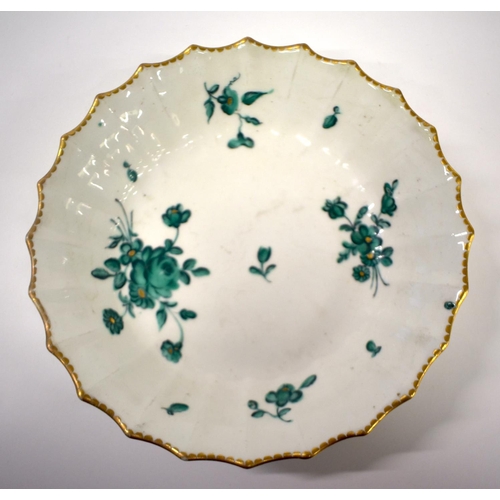 275 - 18th century Chelsea-Derby porcelain teabowl and saucer and matching saucer dish decorated in green ... 