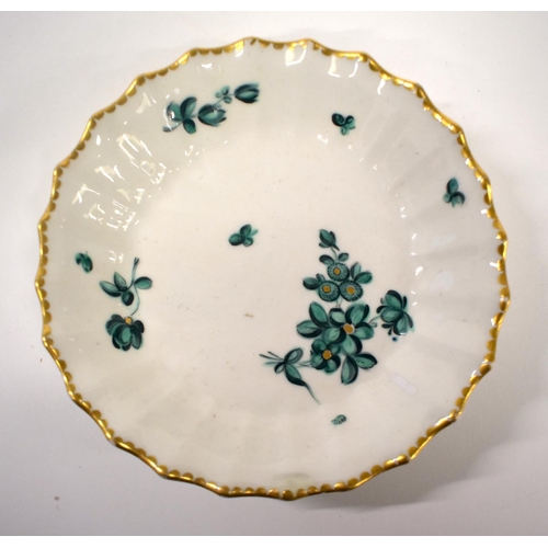 275 - 18th century Chelsea-Derby porcelain teabowl and saucer and matching saucer dish decorated in green ... 