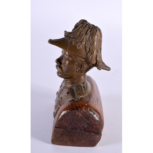 300 - A LATE 19TH CENTURY GRAND TOUR BRONZE BUST OF A MILITARY MALE modelled upon an oak plinth. 12 cm x 8... 