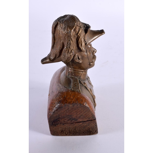 300 - A LATE 19TH CENTURY GRAND TOUR BRONZE BUST OF A MILITARY MALE modelled upon an oak plinth. 12 cm x 8... 